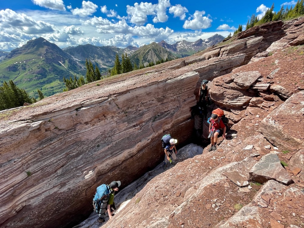 Backpacking in a crack in the mountain.